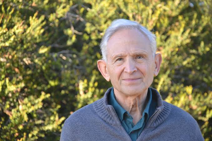 Peter Levine, PhD, developer of Somatic Experiencing, standing outdoors